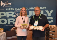 Devon Kennedy and John Sheehan with Highline Mushrooms show organic mushrooms in transparent packaging.