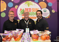 Mike Reed, Rob Jackson, and Paul J. Mastronardi with Red Sun Farms show different organic greenhouse vegetable options.