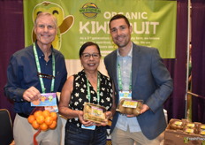 Showing California grown organic kiwis as well as mandarins are Mike Noland, Cecilia Villalobos, and Travis Noland with Wild River Fruit.