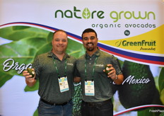 Kraig Loomis and Andrew Gomez with GreenFruit Avocados proudly show avocados from Colombia.