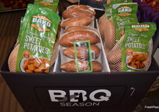 This POS display shows the versatility of sweet potatoes during grilling season.