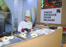 Chef Kenneth Loo from Hong Kong, preparing vegetables from Belgium for visitors.