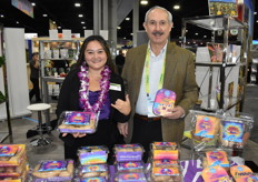 Marissa Bowden and Enrique Lobo with Hawaii Pacific Farms are showing colorful packaging for their sweet potatoes and other Hawaii grown products. 