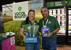 Baltazar Garcia and Erica Lovelace with Local Bounti proudly show Living Basil and a Spring Mix lettuce blend. 