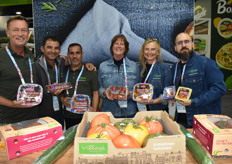 Team Village Farms Fresh shows tomatoes in different types of packaging. From left to right: Dirk de Jong, Christian Valera, Jorge Arturo Michel, Diana Strohm, Meredith Reilly, and Carlos Kelley.