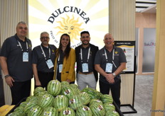 Team Pacific Trellis / Dulcinea proudly poses in front of a melon display.