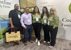 Baha Sadduk of Markon Cooperative, Inc. visits Tony Ojeda, Carmen Placensia, Natalie Macedo and Tami Gutierrez at the Coastline Family Farms booth.