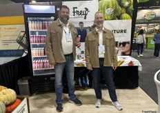 Jim Fuller and Derek Sledge hand out samples of Frey Farms’ juices.