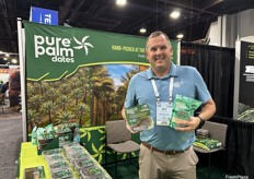 Ben Antongiovanni of Pure Palm Dates with two of the company’s packaged date products.