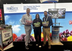 DLJ Produce’s John Zaninovich, Cristin Coombs, and Dustin Clyde show off the company’s Razzle Dazzle grapes.