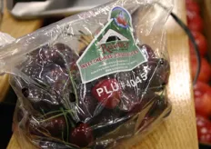 Cherries in a bag at the booth of Rainier Fruit Company