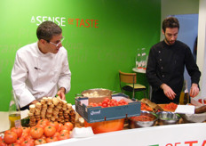 Chef Eyal Shani and sous chef at work in stand of Zeraim Gedera