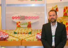 Robert Boudreau of Savoura in his booth. A Quebec based company; Savoura tomatoes. Eat them without moderation!