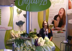 Julie Nichols in her booth of Organzo. She is also the lady in the picture behind her.