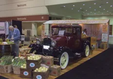 The booth of Farm Fresh Produce with their Ford.