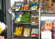 This small shop displays its limited produce offer next to its entrance.