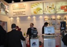 Kay Wagner behind the machines on the very busy Booth of Contact Auszeignumgssysteme