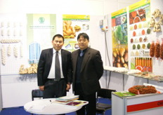 Mr. Zhang Guo Jun, Vice Manager of AHCOF International Development China with another colleague