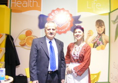 Mr. Andreas Catsellis, General Manager of Cyprus Phassouri Plantations with a woman representing their tradional dress