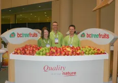 Maggie Peek, Adrian Abbott and Lance Mc Ginn of B.C. Tree Fruits Limited introducing the elegant Nicola Apple
