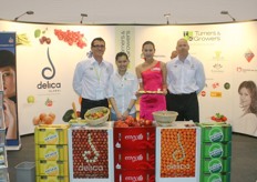 "Campbell Naish (on the left) with his colleagues promoting their products especially the "Envy" apple. The first container shipment of the new apple was in July."