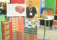 Mike Sandmann promotes boxes of ClimaGuard container board, which offers increased packaging strength under high-humidity conditions.