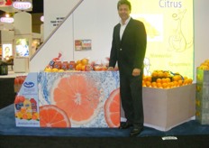 Mark Hanks of DNE posing next to retail display box - part of the combined DNE/Ocean Spray merchandising effort.