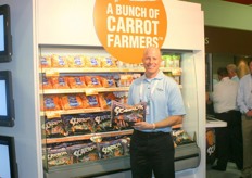 Bryan Reese of Bolthouse Farms holds a bag of Scarrots.