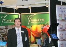 Stuart Booker Association Manager of the UK's Commercial Horticultural Association in front of one of the UK stands.