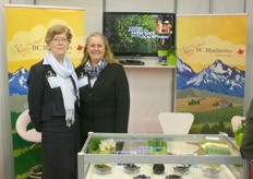 Wilhelmina de Jager and Debbie Etsell promote BC Blueberries, which have a new logo.