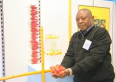 John Kavuma, director of Jaksons Uganda, proud to show their hot peppers.