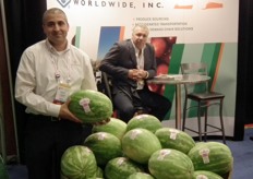 Sav Tsoukalas of C.H. Robinson Worldwide promotes the pink ribbon watermelon. For every bin that is sold, the company donates $2 for breast cancer charity.