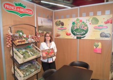 "Marie Dérédec from Prince de Bretagne. The artichoke is already available, because of good weather. Marie holds a new product, a box with different kind of tomatoes, it also cares the label in France: "Saveur de L'annee 2011"."