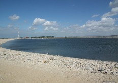 Nearby the avocado fields. Israel has built a water reservoir to collect water.