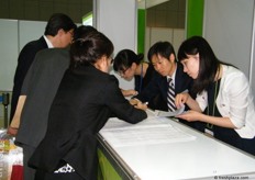 organizers assisting the buyers to find their Korean exporters