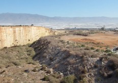 This hole in the ground is the result of horticultural production. A part of the local growing media is sand. That from the surrounding area is of low quality, therefore that used for growing is taken from the coast. The beach is then restocked from quarries such as this one. Elsewhere in the vicinity soil extraction has created large lakes that are now wildlife sanctuaries.