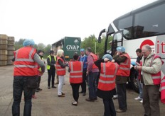 Delegates get kitted up before entering the packing sheds.