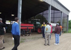 Delegates are shown around the farm.