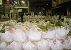 checking his vegetables after the bidding