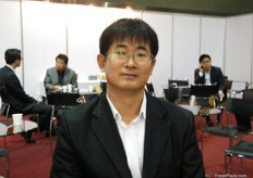 Mr. Jeff Jun, Manager of Gyeongnam Trading, the company is known for their strawberries and persimmons