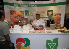 Chef sampling produce from Ontario Greenhouse Vegetable Growers