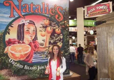 Natalie Sexton of Natalie's showing some of her company's 100% natural fruit juices.