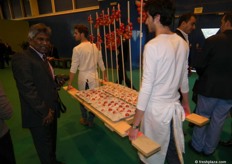 Kris Charan inspects the vegetable carriers