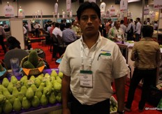 Lucio Valle Varela, of Agrocosco, showing chayotes, tomatillos and other exotic products.