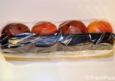 The tray contains four fruits ...