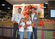 Kevin Safrance, Anni, Milla and Paul Mastronardi from Sunset Produce holding the Trio (red, yellow and orange grape tomato) and Quattro pack (with the same three, including the Kumato™). There is also a Duo pack available with the red and orange grape tomato. Anni and Milla are holding the Lumato™ a heirloom type tomato on the vine.