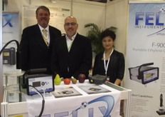 Micheal Larman and Leonard Felix with their Chinese colleague at the Felix stand.