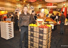 Peter Quiring from Nature Fresh Farms standing besides their organic line.