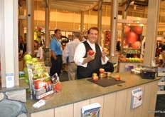 "A Magician at the Stemilt stand shows two "new" Pinata apples."