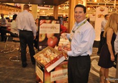 Howard Nager of Domex Superfresh Growers holds a bag of Autumn Glory.